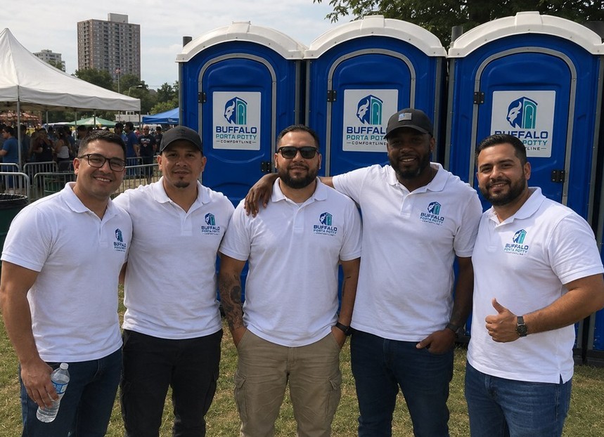 The Buffalo Porta Potty Comfortline team at an event in Buffalo, NY
